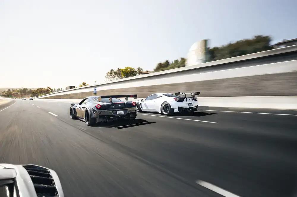 GT3 cars battling on track during a sim race